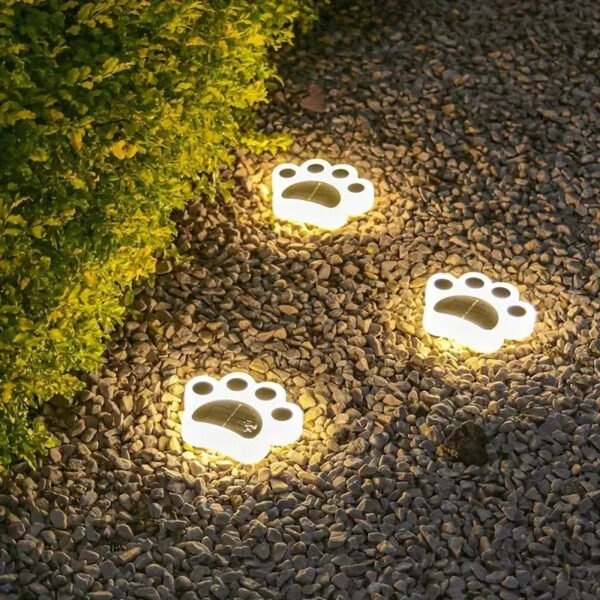 Solarne lampki ogrodowa LED w kształcie śladów łapek – ciepłe światło