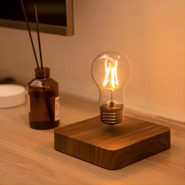Biurkowa lampa LED z lewitującą żarówką i kwadratową podstawą