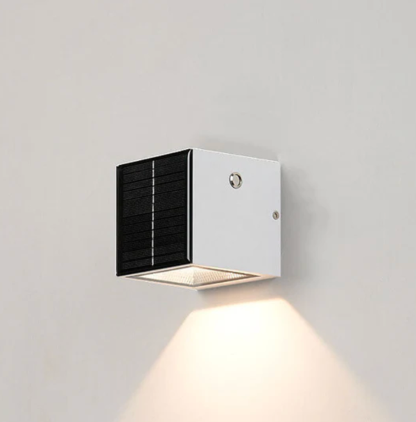 Biały zewnętrzny kinkiet solarny LED góra-dół